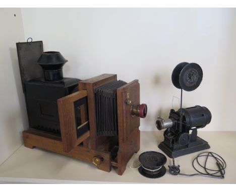 A Salex magic lantern by The City Sale and Exchange London, and a JP land crank film projector 