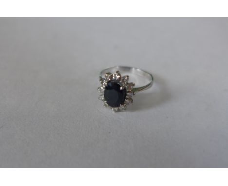 An 18ct white gold sapphire and diamond ring, size L, approx 3 grams, sapphire approx 8x6mm, generally good condition, sapphi