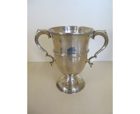 A Mappin and Webb twin handled trophy cup, Sheffield 1901/2 - no engraving, minor dent otherwise generally good, approx 14.4 