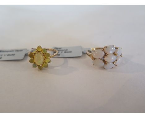 Two 9ct gold opal rings, one being a cluster ring with central stone surrounded by ten small yellow opals, size N 1/2 approx 