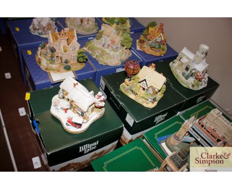 Three Lilliput Lane models Decorating The House, Up Up And Away, and Lead Kindly Light In Winter with boxes 
