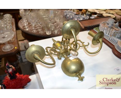 A 19th Century brass Dutch style three branch wall light