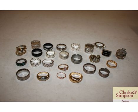 A large collection of various rings to include titanium 