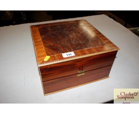 A mahogany box and contents including manicure set; various tools etc