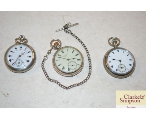 A silver pocket watch; two others and a watch chain