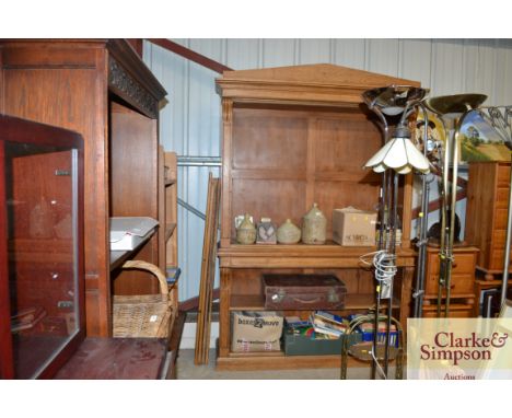 A large Victorian light oak bookcase