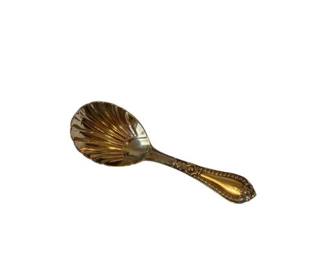 A stunning example of a George Adams silver caddy spoon having a bowl in shell form with a clear hallmark for London circa 18