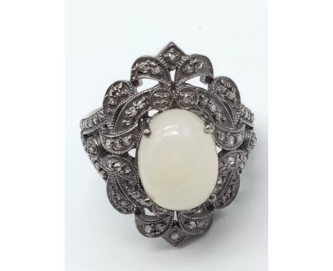 Fire Opal and Diamond ring in 925 silver with 3.95ct Opal and 0.70ct diamonds weight 7.4g and size M1/2 