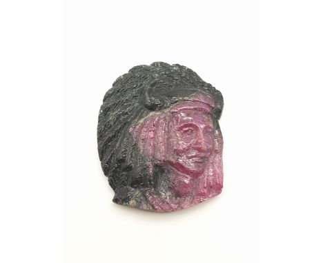 Carved natural ruby of a native American portrait, weight 14g 