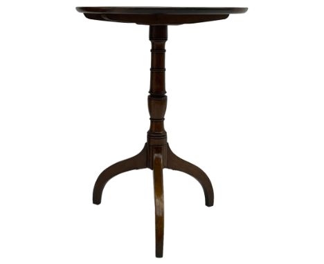 Early 19th century mahogany tripod table, circular dished tilt-top with moulded edge, on ring turned pedestal with three out-