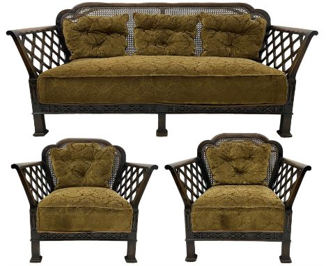 Early 20th century three-piece bergère suite - three seat sofa (W177cm, H82cm, D75cm); pair of matching armchairs (W84cm); si