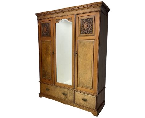 Late Victorian walnut triple combination wardrobe, projecting moulded and dentil cornice, central shaped bevelled mirror glaz