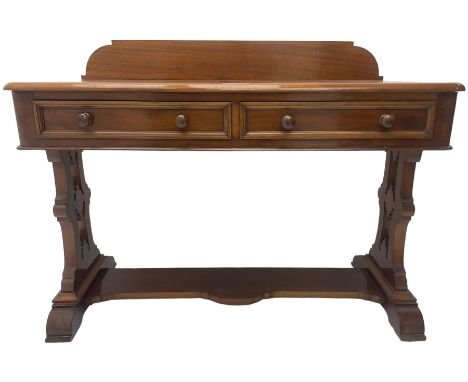 Victorian mahogany washstand, raised back over rectangular top with rounded front corners, two frieze drawers with moulded fr