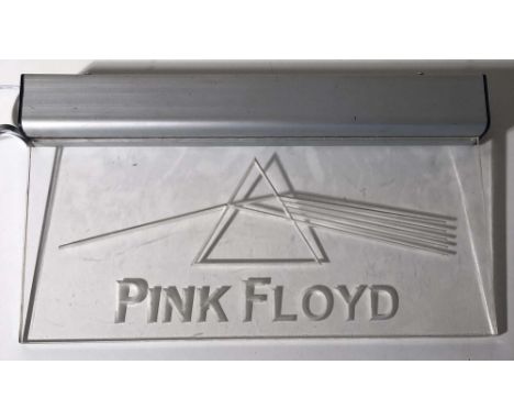 PINK FLOYD LIGHT UP SIGN. An engraved glass sign bearing Pink Floyd name and insignia, lit up from above by working LED light