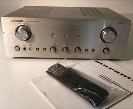 MARANTZ PM 7200 INTEGRATED AMPLIFIER. A Marantz PM7200 amplifier in original box with remote control. Some scratching/cosmeti