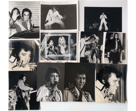 ELVIS PRESS PHOTOGRAPHS. Eleven photographic prints depicting Elvis Presley mostly circa 1970s. Seven bear stamps from 'Ron G