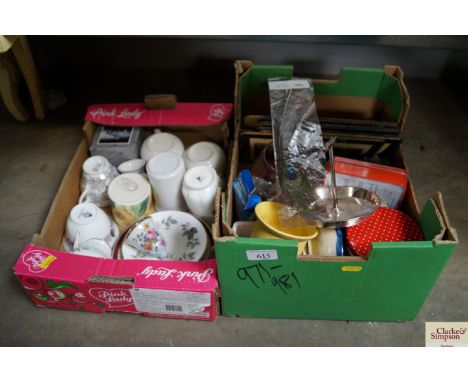 Two boxes of sundry items to include; Royal Worcester mugs, place mats and a reading light etc.