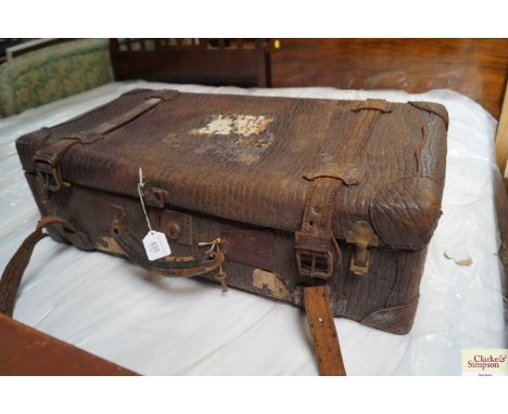 A vintage walrus skin suitcase