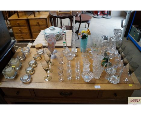 A quantity of glassware to include; tea light holders, coloured glass, decanter etc.