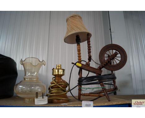 A table lamp in the form of a spinning wheel and one other lamp