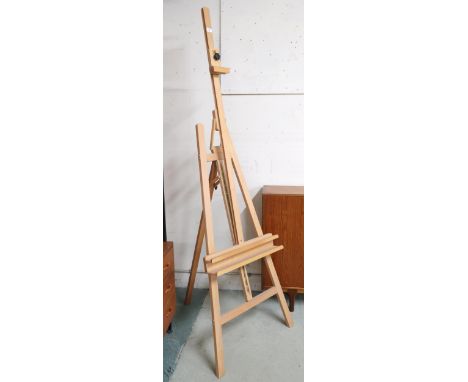 A 20th century Daley Rowney beech folding artists easel, 199cm high Condition Report:Available upon request