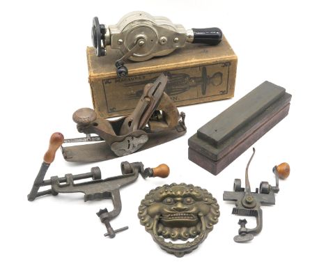 A Stanley Rule and Level Co. No. 113 compass plane, two table-mounted cast iron presses/moulds, a boxed Macaura's Pulsacon bl