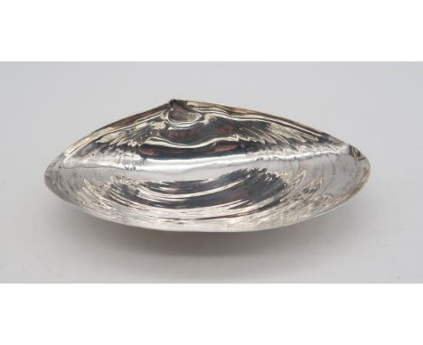 Naval Interest; An American Sterling shell dish, by Wallace, inscribed 'To LIEUT. CHARLES H. POLLOCK, R. N. OF H.M.S. "DUNDEE