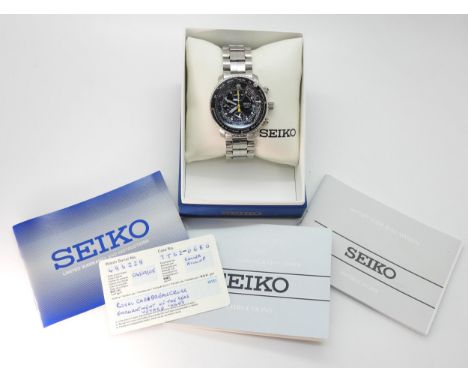 A Stainless steel Seiko Chronograph 200M with bright yellow details to the hands and chapter ring, back of the case stamped 4