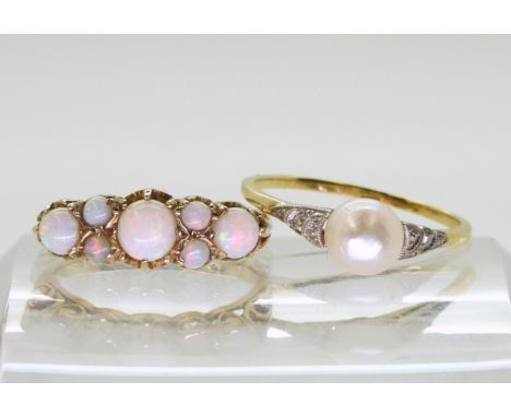 A 9ct gold opal cluster ring with a classic scroll mount, size N, 2.8gms, a 14k gold pearl and diamond vintage ring, size Q, 