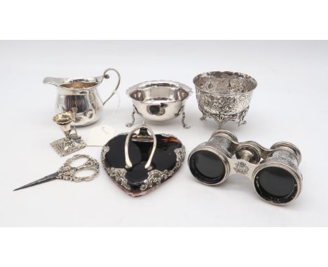 A collection of silver including a late-Victorian silver tortoiseshell desk clip, by Atikns Brothers, London 1899, the clip m