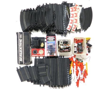 A large quantity of Scalextric track, vehicles and accessories Condition Report:Available upon request