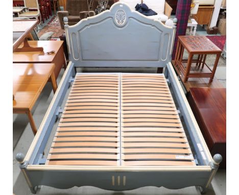 A 20th century pastel blue and cream painted Grange provincial directoire design king sized bed with foliate relief to headbo