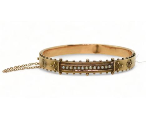 A 9ct gold Victorian bangle set with split pearls, hallmarked 1898 Birmingham (af) weight approx 8.7gms Condition Report:Has 