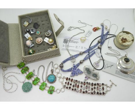 A collection of GemsTV silver jewellery to include a garnet bracelet, tanzanite beads and a pendant, emerald pendant, a labra