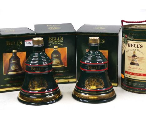 Four Bell's Scotch whisky decanters, for Christmas 1990, 1992, 1993, and 1994, 70cl, 40%, four bottles in cartons 