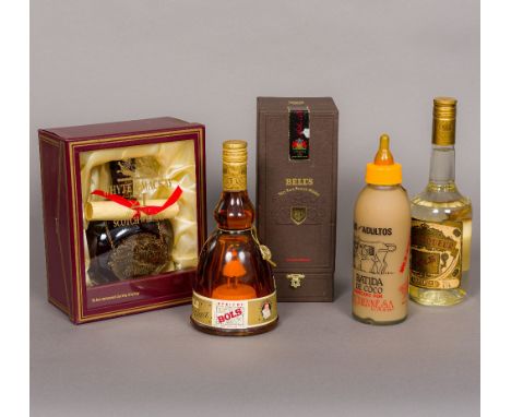 Five bottles of various alcoholIncluding: a boxed Bell's 21 Years Old Royal Reserve Very Rare Scotch Whisky, and a boxed Whyt