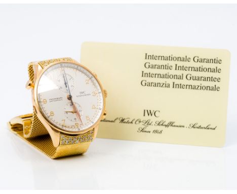 An IWC (International Watch Co Ltd) gentleman's gold cased Portugieser Rattrapante split second chronograph wristwatchThe mul