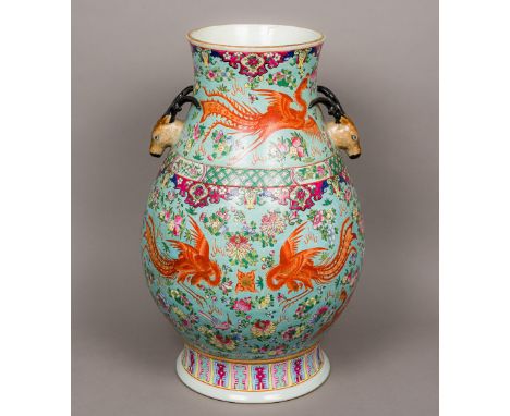 A large Chinese porcelain vase, probably Republic period Of baluster form, with twin deer mask handles, decorated in the roun