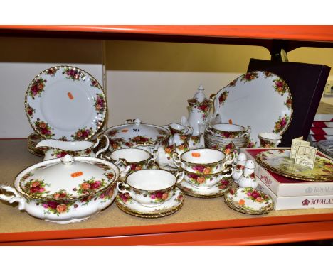 A GROUP OF ROYAL ALBERT DINNERWARE AND COFFEE SET, comprising two lidded tureens, six dinner plates, a gravy jug and stand, a