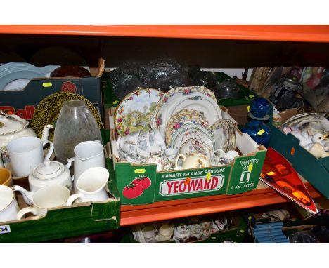 SIX BOXES OF CERAMICS AND ORNAMENTS, to include a Poole Pottery spear shaped Delphis design platter, a Mdina turquoise glass 