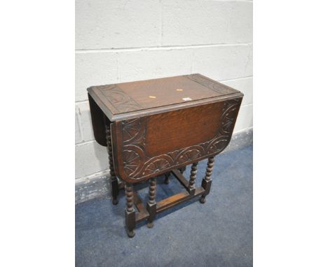 AN OAK GATE LEG TABLE, on bobbin turned legs, open length 95cm x closed length 35cm x depth 61cm x height 72cm