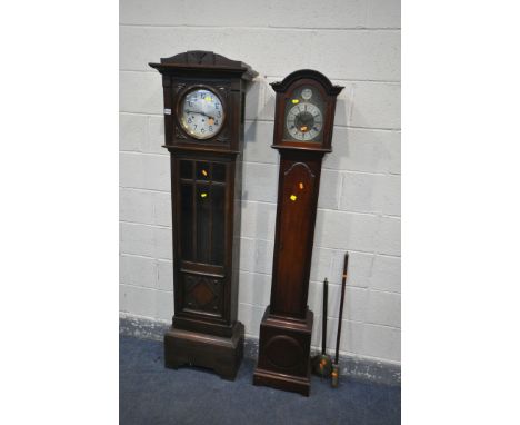 AN 20TH CENTURY OAK LONGCASE CLOCK, with a silvered dial, height 182cm (locked trunk door) and a mahogany granddaughter clock