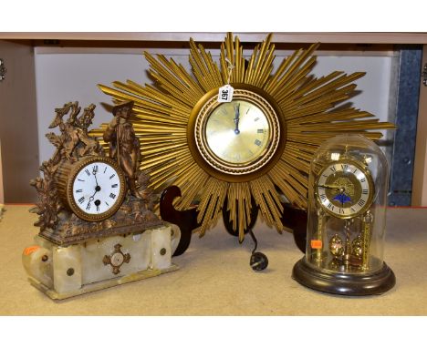 THREE CLOCKS, to include an electric Metamec gold sunburst style wall clock, width 57cm x height 37cm (in need of rewiring), 