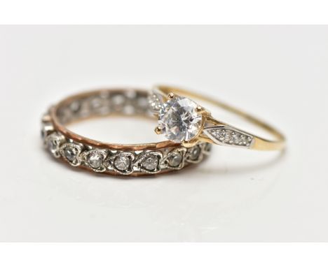 A 9CT GOLD CUBIC ZIRCONIA SET RING AND A FULL ETERNITY RING, the 9ct yellow gold ring set with a central circular cut colourl