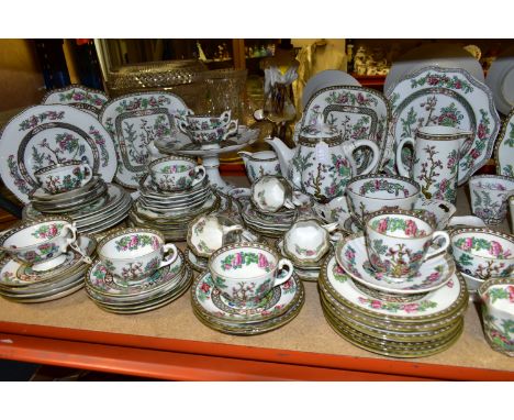 A QUANTITY OF COALPORT INDIAN TREE DINNERWARES, comprising two bread and butter plates, one footed cake stand, two jugs, one 