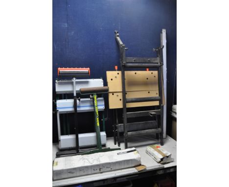 A SELECTION OF STANDS/WORKBENCHES to include a Wolfcraft clamping folding workbench, another folding workbench, two adjustabl