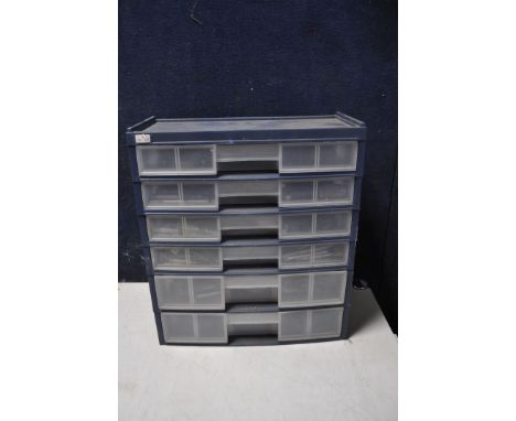 A COLLECTION OF ENGINEERS TOOLS to include a collection of tap and die sets, tap wrenches etc. all inside a Zag plastic six d