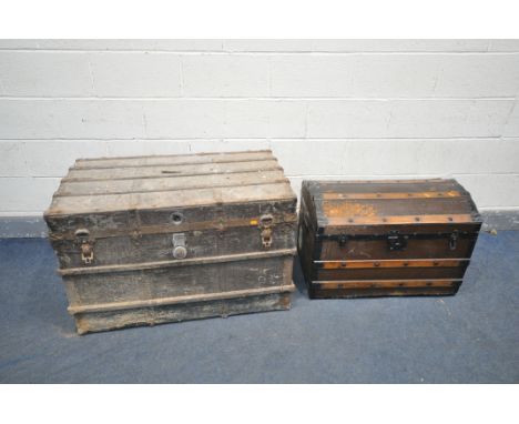 TWO VINTAGE TRAVEL TRUNKS with oak and steel banding to both, one with a domed top width 75cm x depth 46cm x height 53cm and 