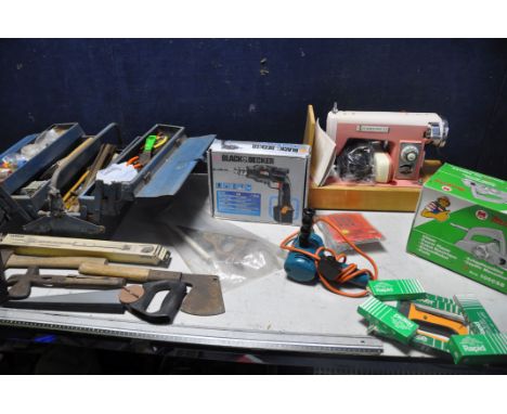 A COLLECTION OF TOOLS to include a metal toolbox containing hammers, drill bits, files etc. a wheeled stool containing six pa