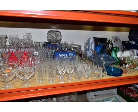 A LARGE QUANTITY OF CUT CRYSTAL AND COLOURED GLASSWARE, a boxed pair of brandy glasses, three decanters, a boxed Tutbury Crys